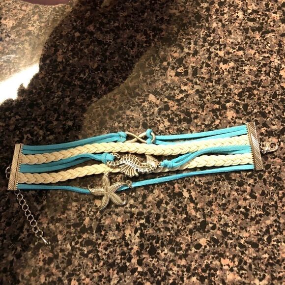 Seahorse starfish infinity sign teal boho bracelet - Picture 5 of 5